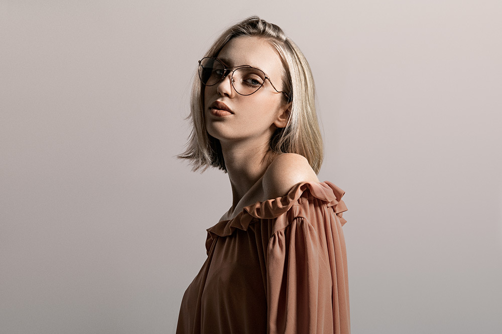 Natália Pažická wears aviator prescription glasses Miu Miu